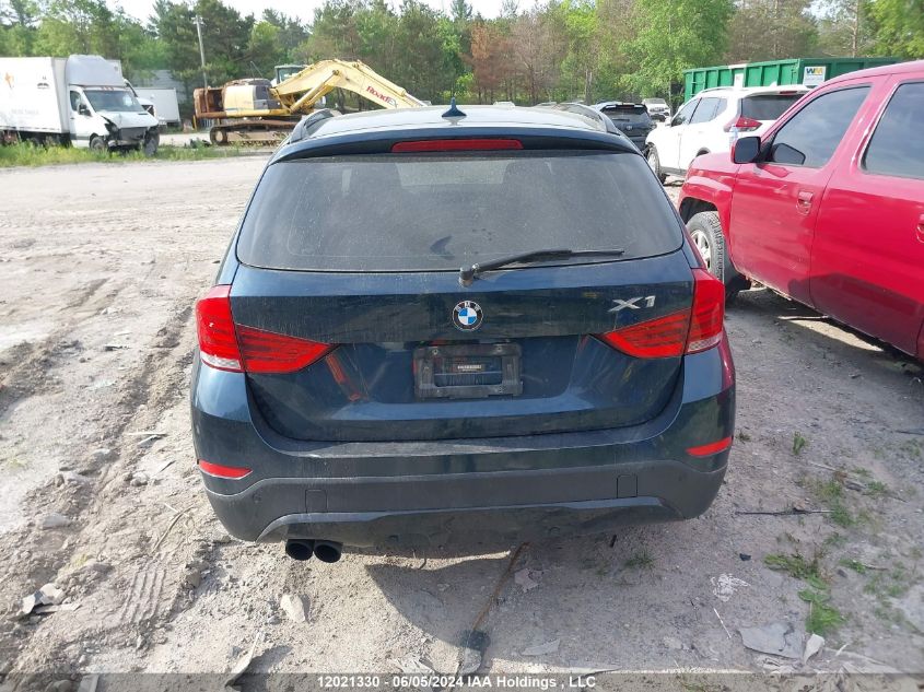 2014 BMW X1 VIN: WBAVM5C5XEVV91427 Lot: 12021330