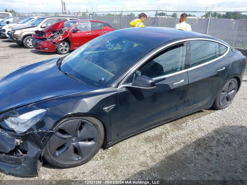 2018 Tesla Model 3 VIN: 5YJ3E1EA7JF028659 Lot: 12021380