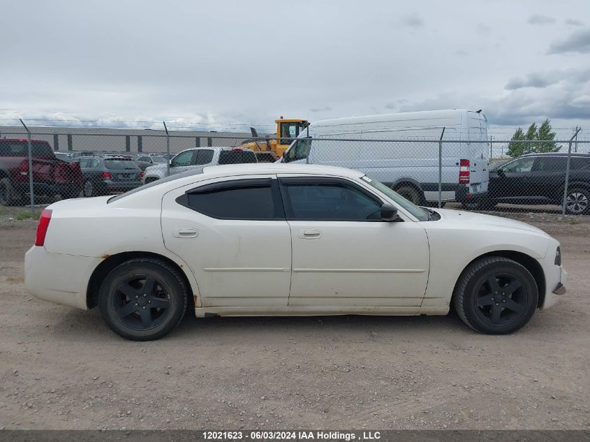 2009 Dodge Charger VIN: 2B3KA43V59H595023 Lot: 12021623