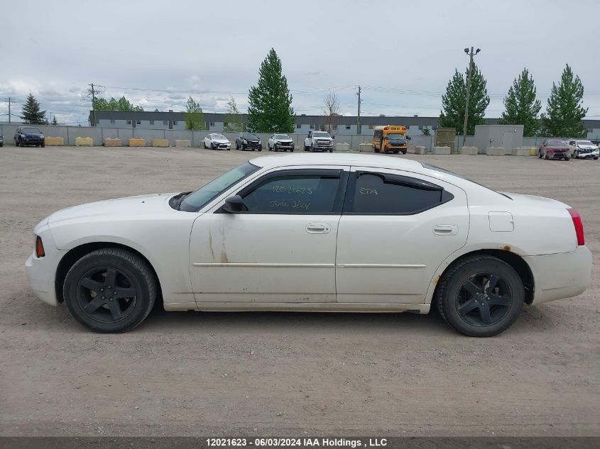 2009 Dodge Charger VIN: 2B3KA43V59H595023 Lot: 12021623