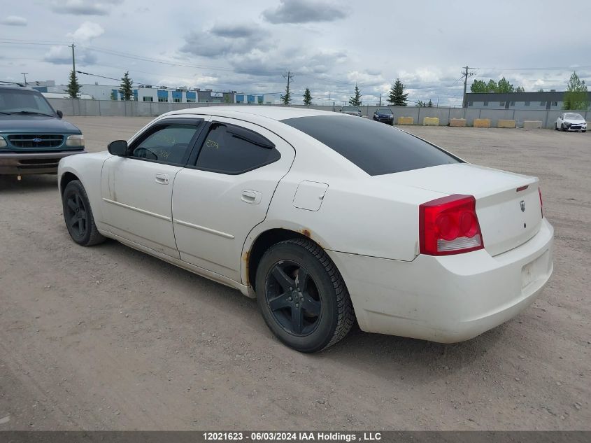 2009 Dodge Charger VIN: 2B3KA43V59H595023 Lot: 12021623