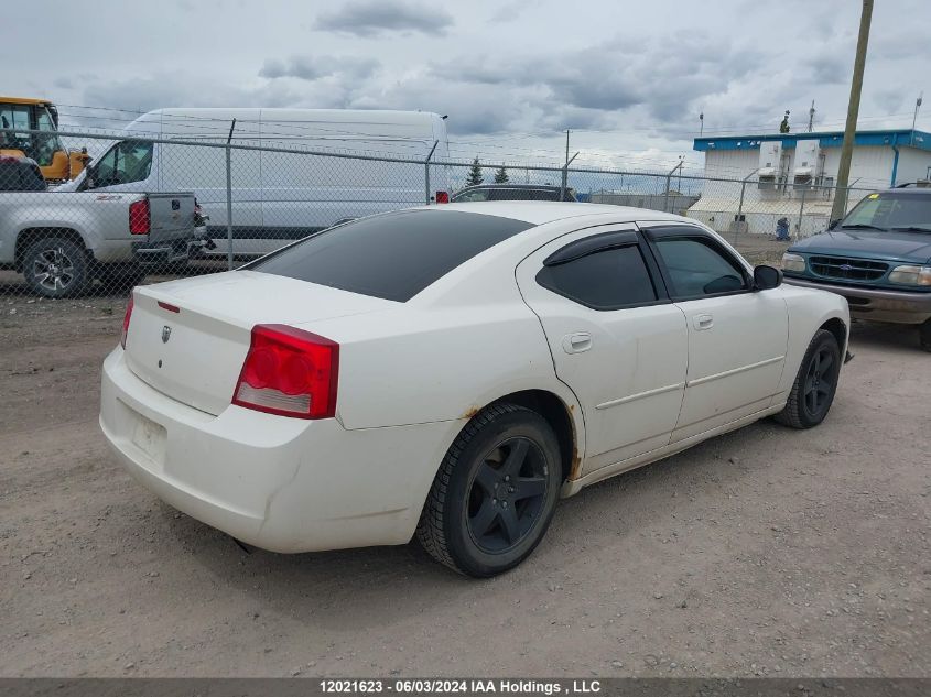 2009 Dodge Charger VIN: 2B3KA43V59H595023 Lot: 12021623