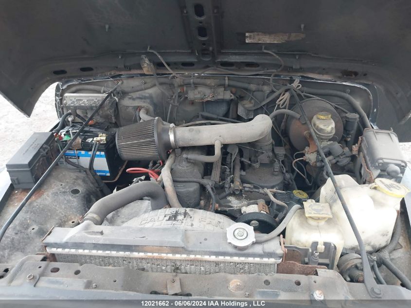 1999 Jeep Wrangler / Tj Sport VIN: 1J4FY19S4XP472288 Lot: 12021662