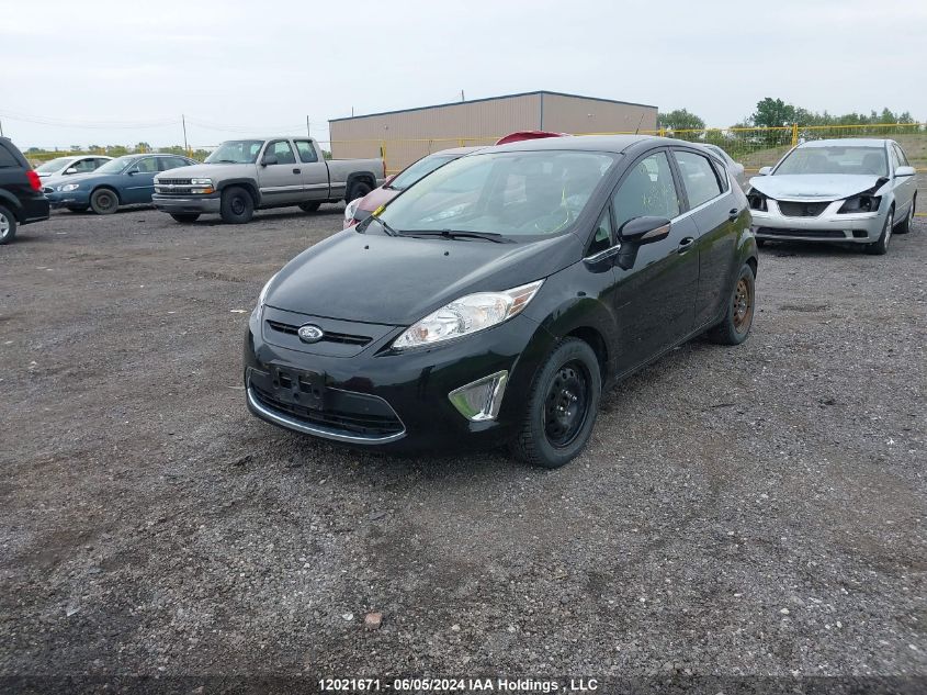 2011 Ford Fiesta Ses VIN: 3FADP4FJ7BM199543 Lot: 12021671