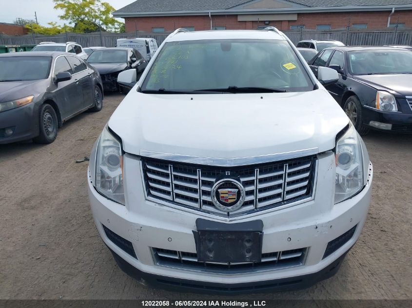 2014 Cadillac Srx VIN: 3GYFNEE38ES686102 Lot: 12022058