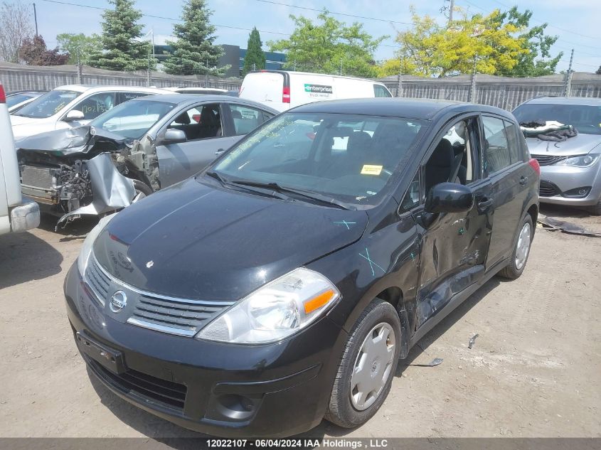 2009 Nissan Versa 1.8S VIN: 3N1BC13E29L472099 Lot: 12022107