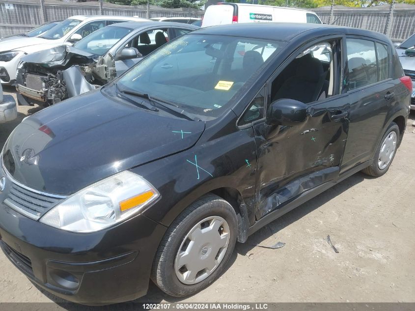 2009 Nissan Versa 1.8S VIN: 3N1BC13E29L472099 Lot: 12022107