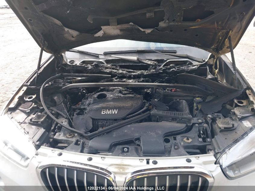 2018 BMW X1 VIN: WBXHT3C38J3H31122 Lot: 12022134