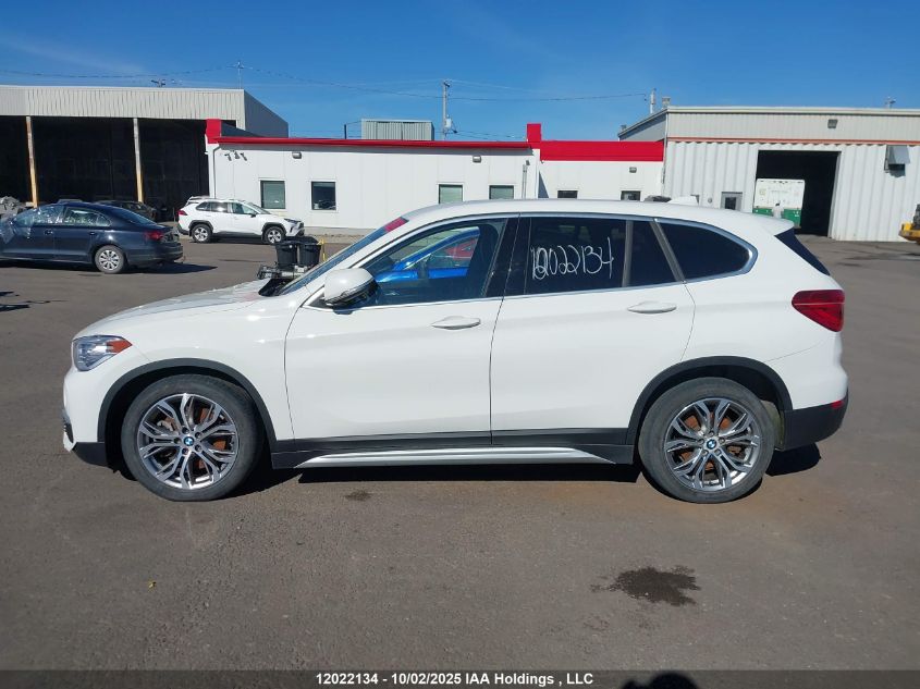 2018 BMW X1 VIN: WBXHT3C38J3H31122 Lot: 12022134