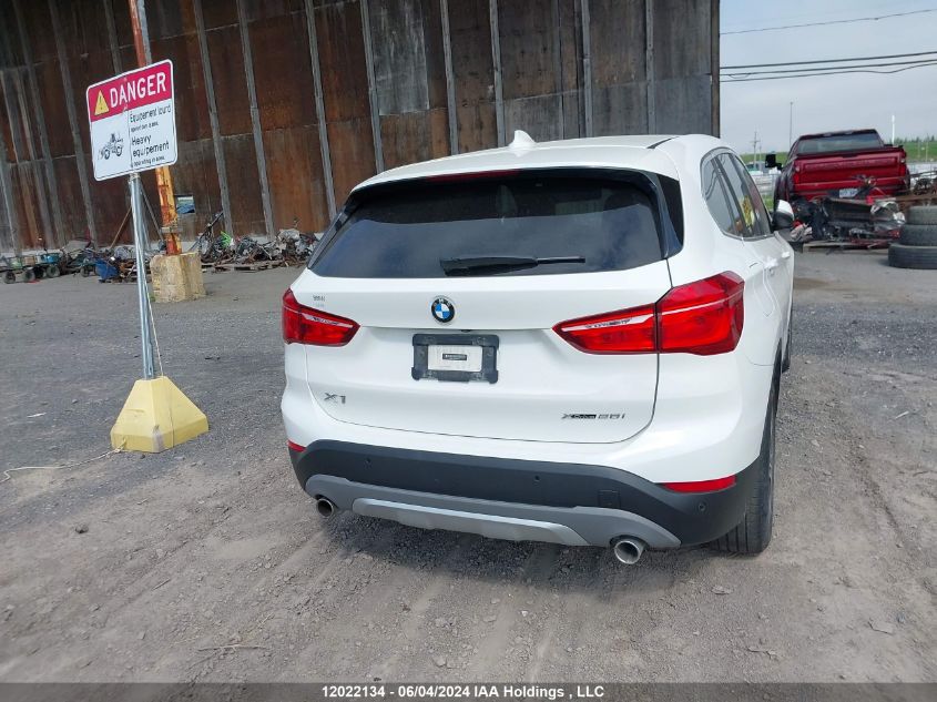 2018 BMW X1 VIN: WBXHT3C38J3H31122 Lot: 12022134