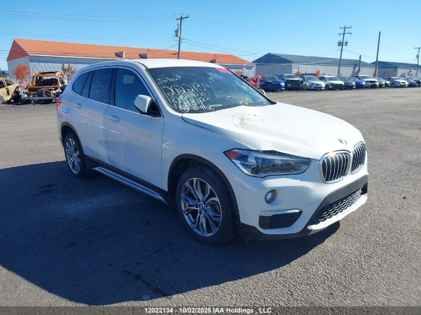 2018 BMW X1 VIN: WBXHT3C38J3H31122 Lot: 12022134
