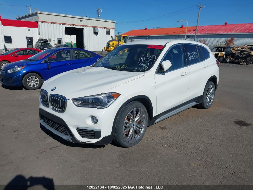 2018 BMW X1 VIN: WBXHT3C38J3H31122 Lot: 12022134