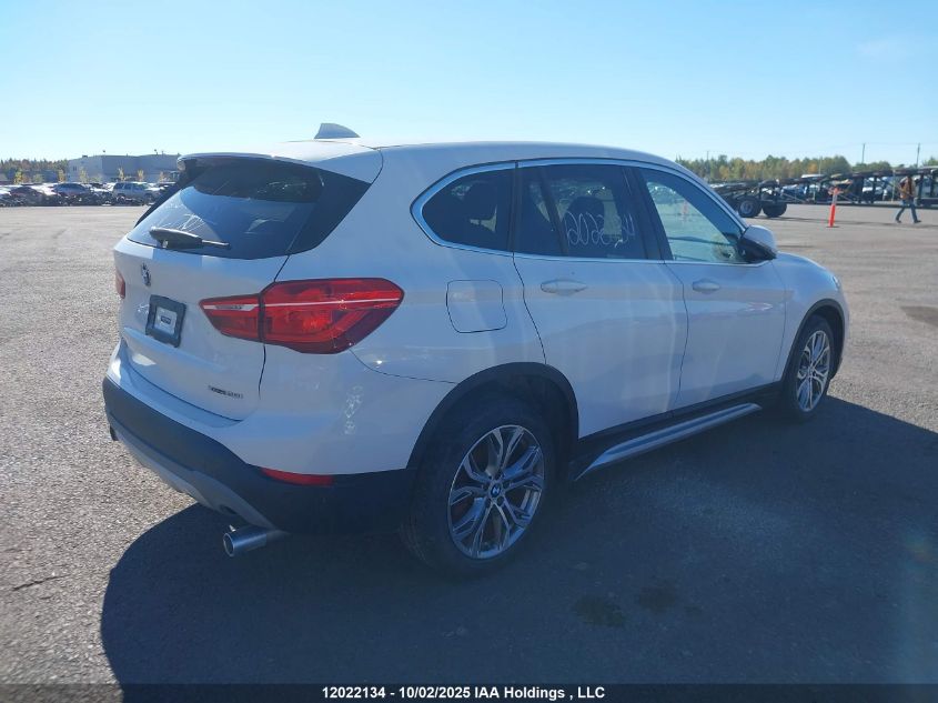 2018 BMW X1 VIN: WBXHT3C38J3H31122 Lot: 12022134