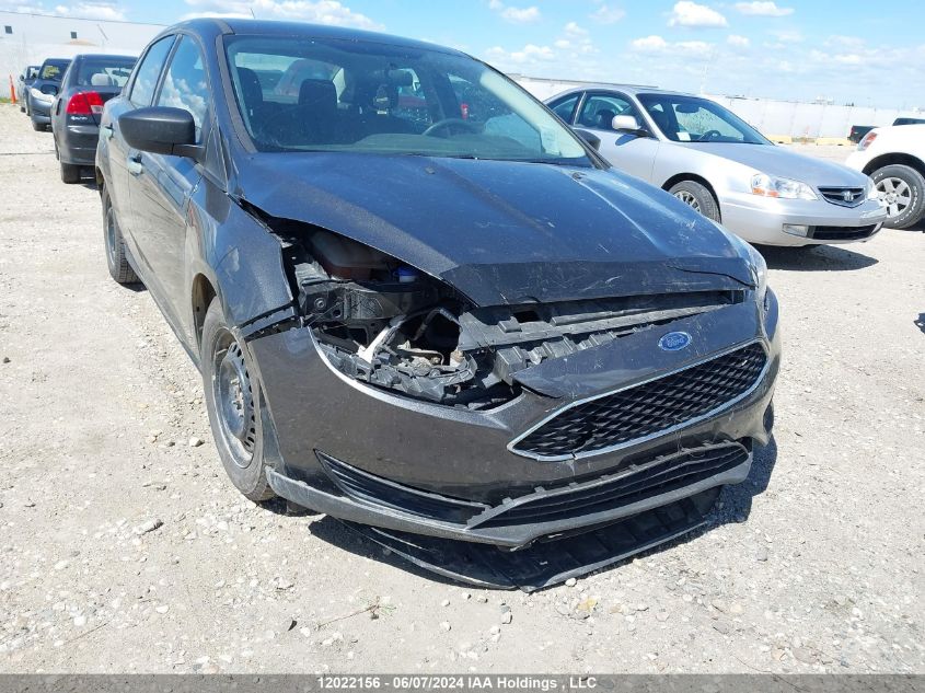 2016 Ford Focus S VIN: 1FADP3E27GL392580 Lot: 12022156