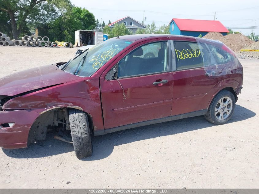 2007 Ford Focus VIN: 1FAFP37N27W269638 Lot: 12022206