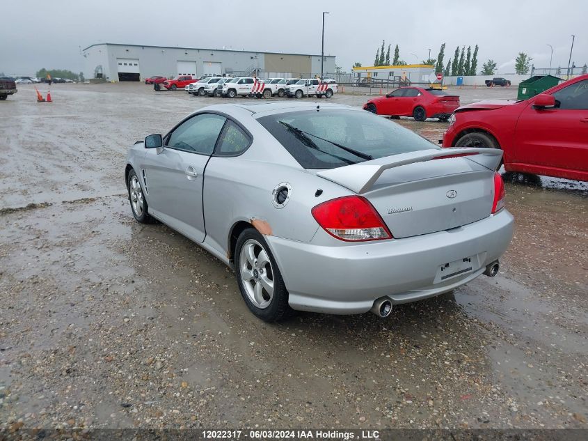 2006 Hyundai Tiburon VIN: KMHHN65D26U201009 Lot: 12022317