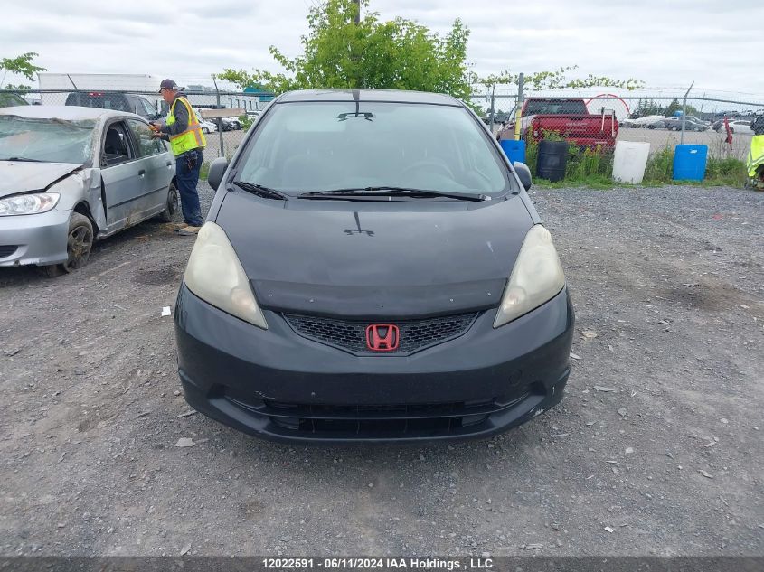 2009 Honda Fit VIN: JHMGE88339S806301 Lot: 12022591