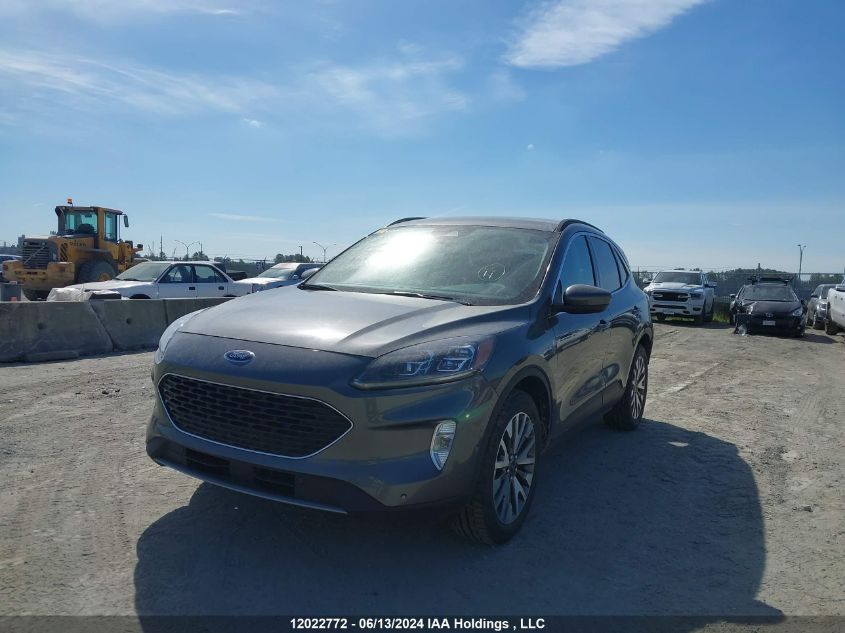 2021 Ford Escape Titanium VIN: 1FMCU9DZXMUA71330 Lot: 12022772