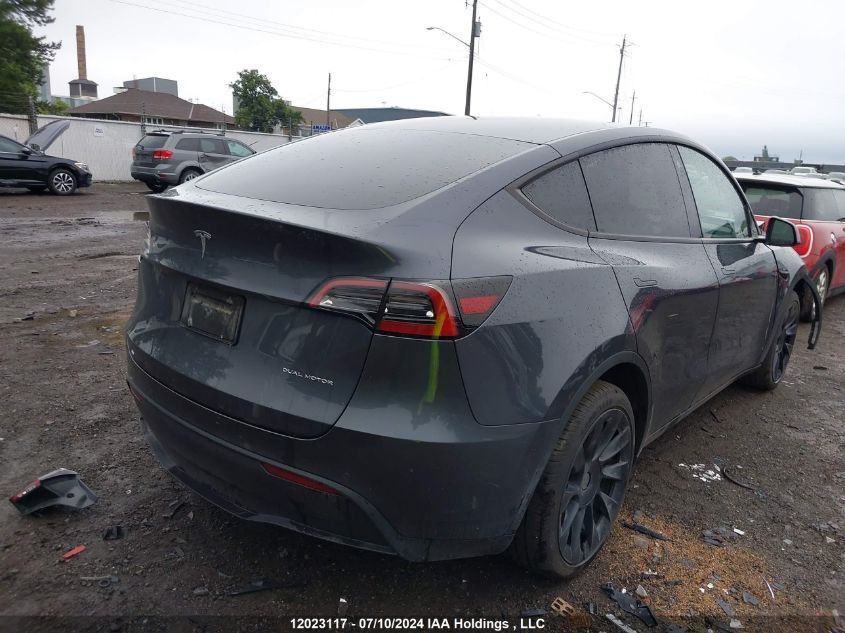 2022 Tesla Model Y VIN: 7SAYGDEE7NF563052 Lot: 12023117