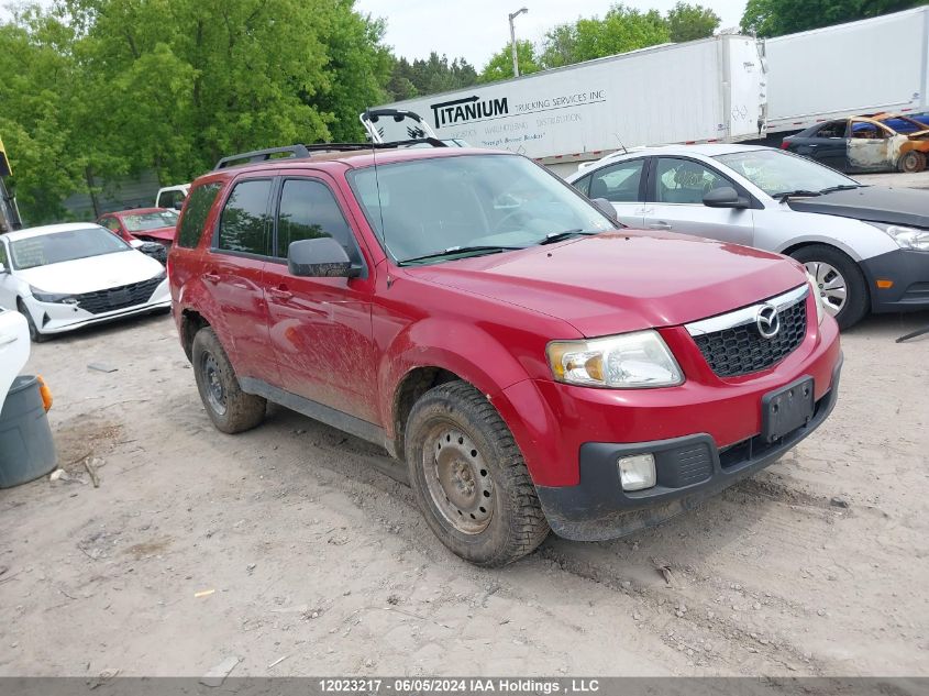 2011 Mazda Tribute VIN: 4F2CY9GG1BKM05062 Lot: 12023217