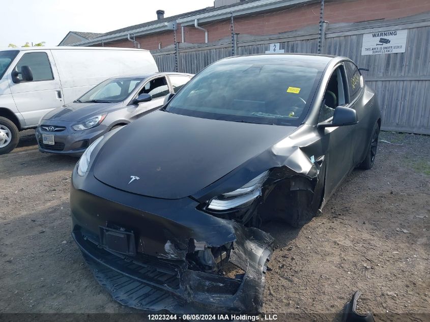 2022 Tesla Model Y VIN: 7SAYGDEE2NF451470 Lot: 12023244