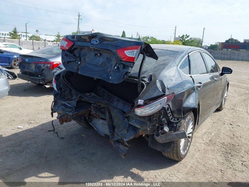 2015 Ford Fusion Titanium VIN: 3FA6P0D96FR100651 Lot: 12023283