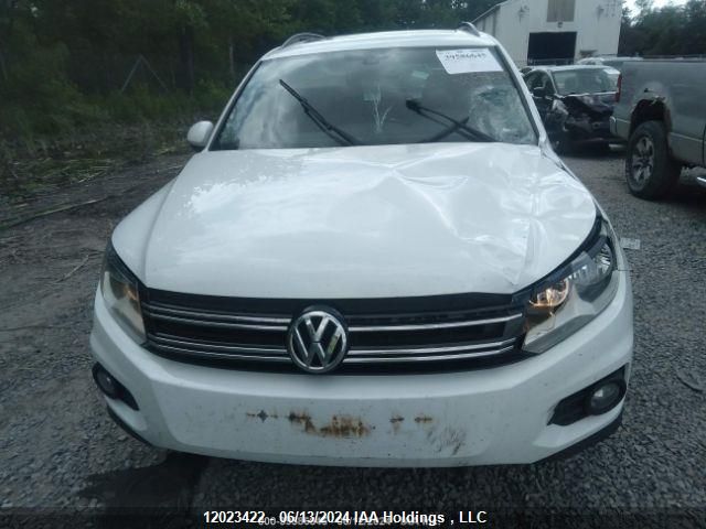 2015 Volkswagen Tiguan VIN: WVGJV7AX9FW590808 Lot: 12023422