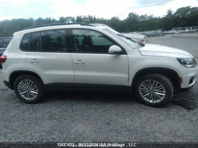 2015 Volkswagen Tiguan VIN: WVGJV7AX9FW590808 Lot: 12023422