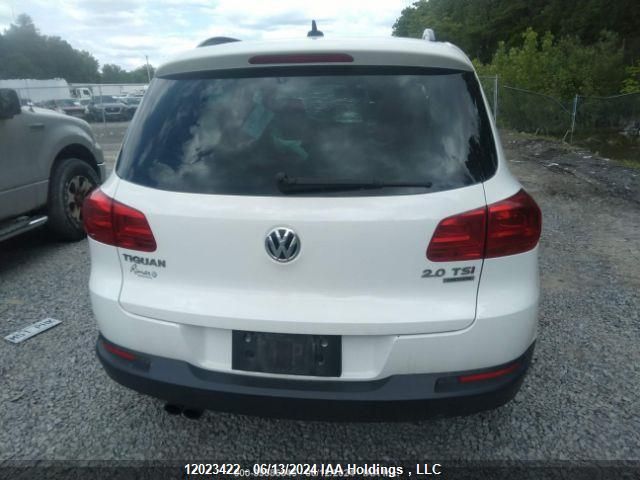 2015 Volkswagen Tiguan VIN: WVGJV7AX9FW590808 Lot: 12023422