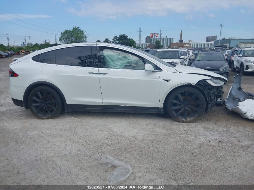 2017 Tesla Model X VIN: 5YJXCBE28HF053098 Lot: 12023527