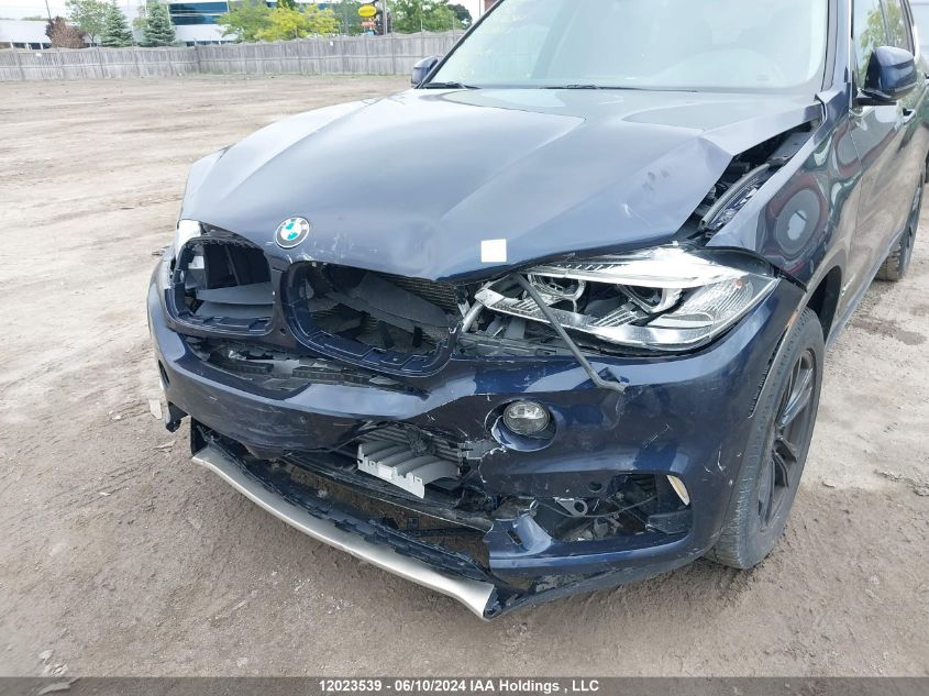 2018 BMW X5 VIN: 5UXKR0C57J0Y04561 Lot: 12023539