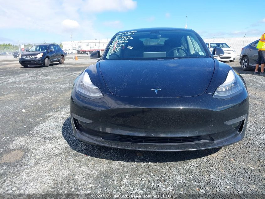 2019 Tesla Model 3 VIN: 5YJ3E1EA5KF323812 Lot: 12023707