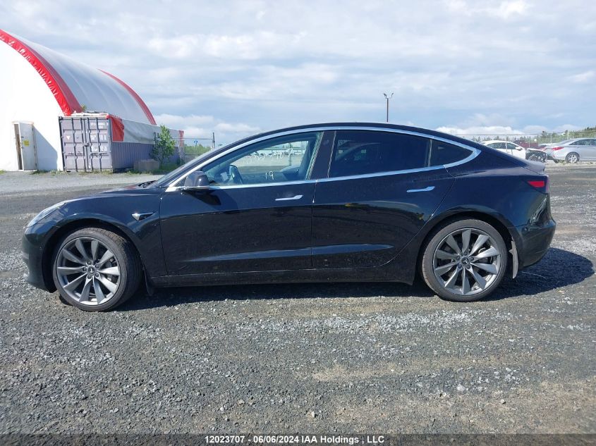 2019 Tesla Model 3 VIN: 5YJ3E1EA5KF323812 Lot: 12023707