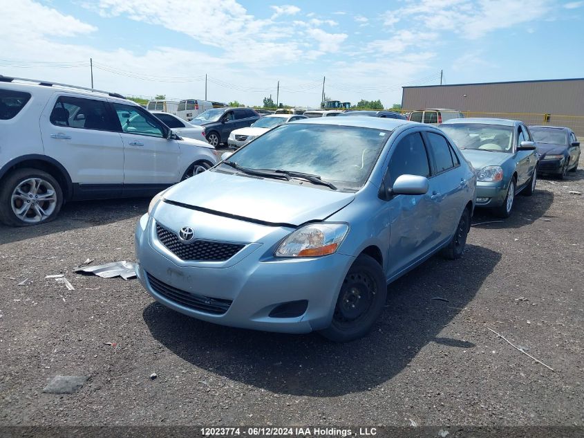 2009 Toyota Yaris VIN: JTDBT903991327275 Lot: 12023774