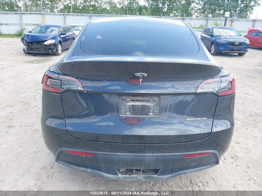 2024 Tesla Model Y VIN: 7SAYGDEE8RF018855 Lot: 12023815