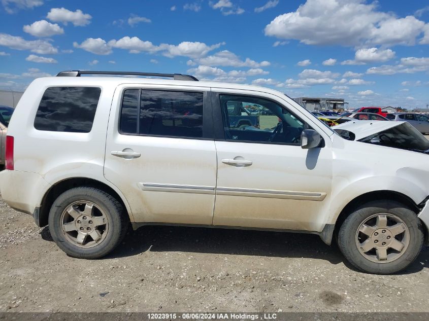 2011 Honda Pilot Touring VIN: 5FNYF4H92BB502105 Lot: 12023915
