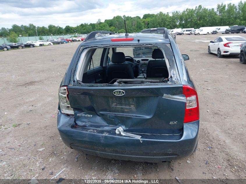 2009 Kia Rondo VIN: KNAFG528197255909 Lot: 12023935