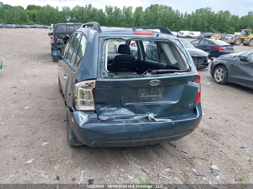 2009 Kia Rondo VIN: KNAFG528197255909 Lot: 12023935