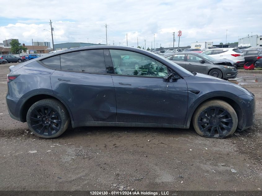 2023 Tesla Model Y VIN: 7SAYGDEE0PF641559 Lot: 12024130