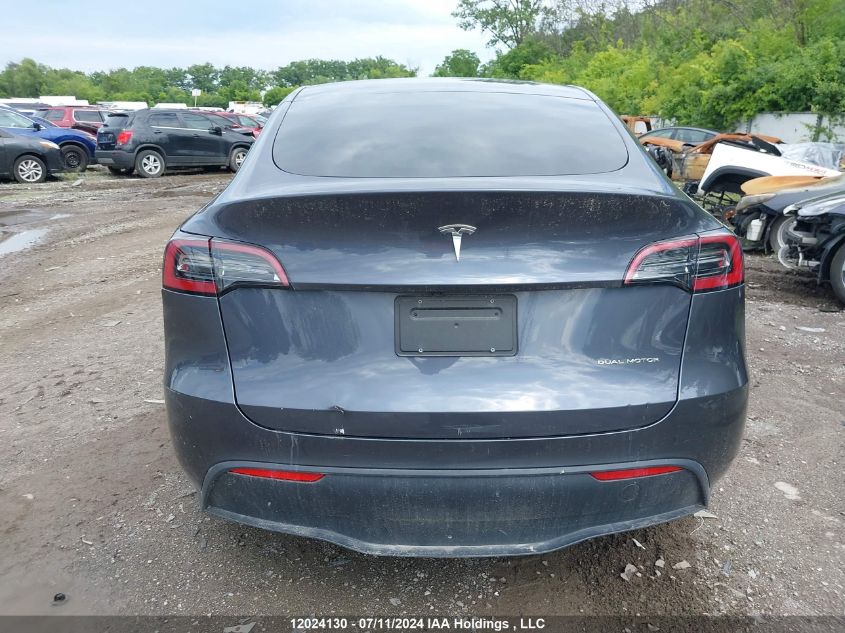 2023 Tesla Model Y VIN: 7SAYGDEE0PF641559 Lot: 12024130