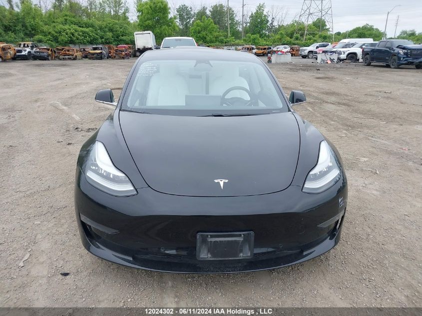 2019 Tesla Model 3 VIN: 5YJ3E1EB3KF407135 Lot: 12024302