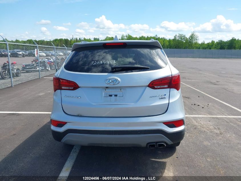 2018 Hyundai Santa Fe Sport 2.0T Se VIN: 5XYZUDLA6JG559118 Lot: 12024456