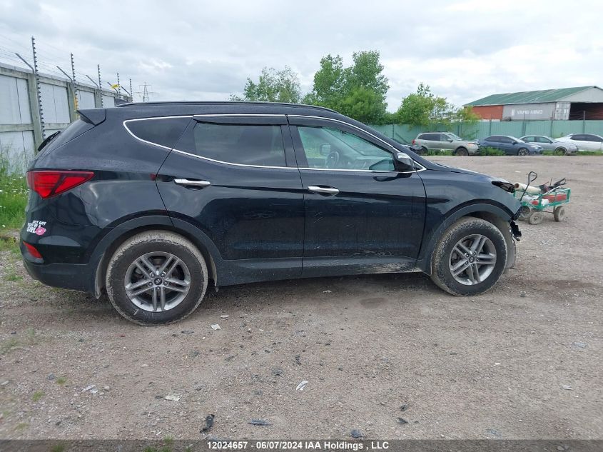 2017 Hyundai Santa Fe VIN: 5NMZUDLB0HH050571 Lot: 12024657