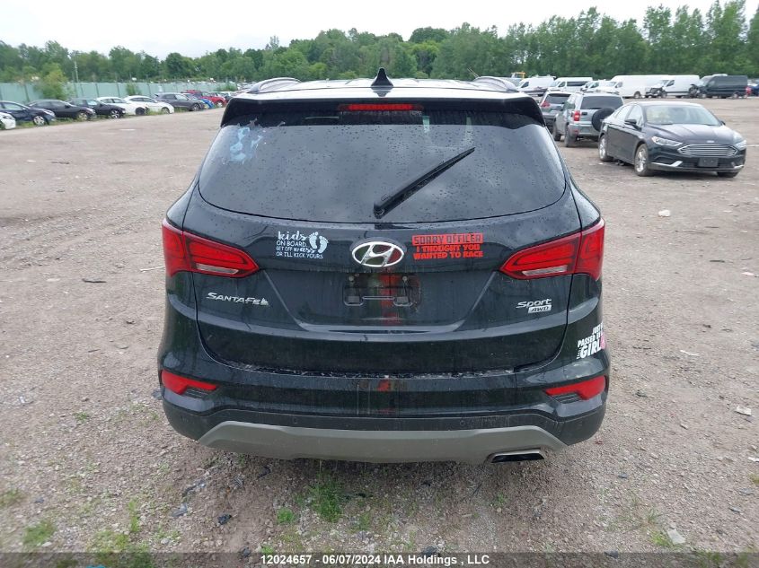 2017 Hyundai Santa Fe VIN: 5NMZUDLB0HH050571 Lot: 12024657