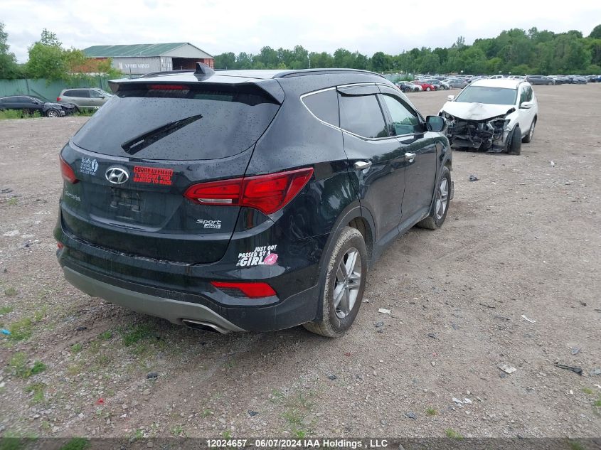 2017 Hyundai Santa Fe VIN: 5NMZUDLB0HH050571 Lot: 12024657