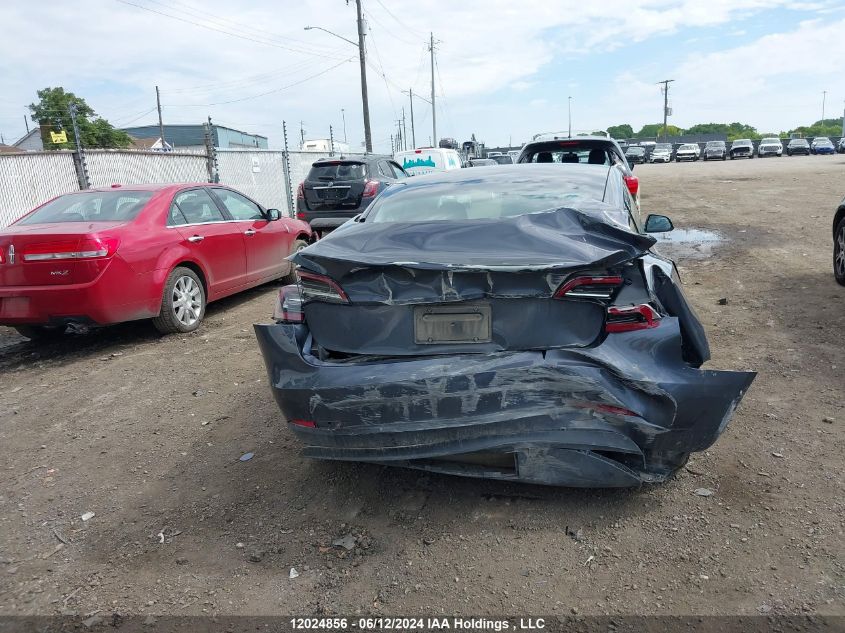 2021 Tesla Model 3 VIN: 5YJ3E1EAXMF017336 Lot: 12024856