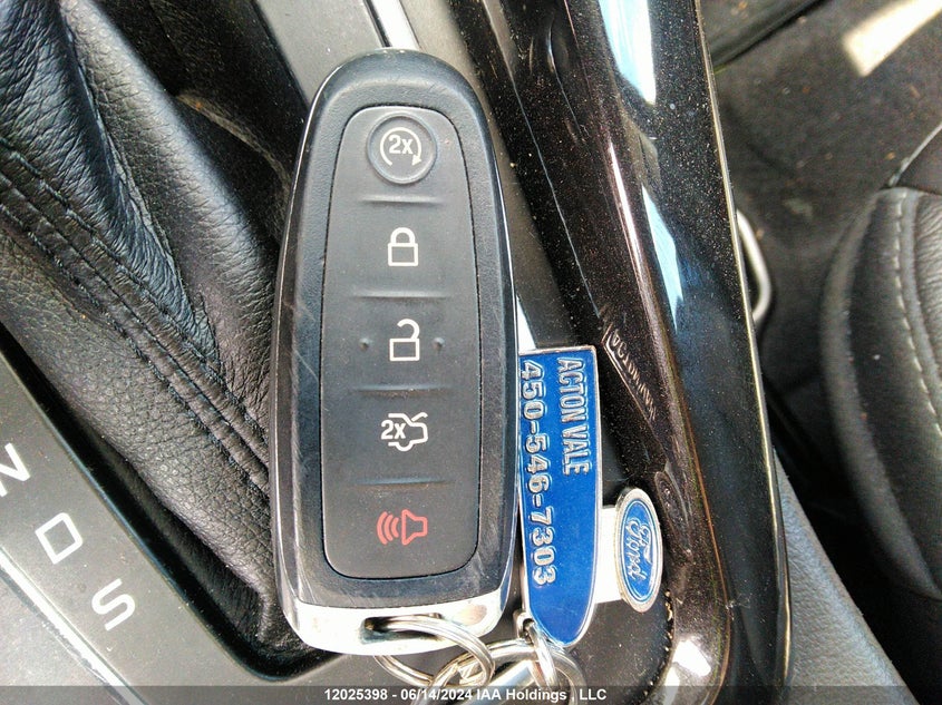 2016 Ford Focus Titanium VIN: 1FADP3N29GL388790 Lot: 12025398