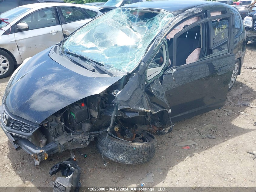 2013 Honda Fit Sport VIN: LUCGE8H78D3000411 Lot: 12025880