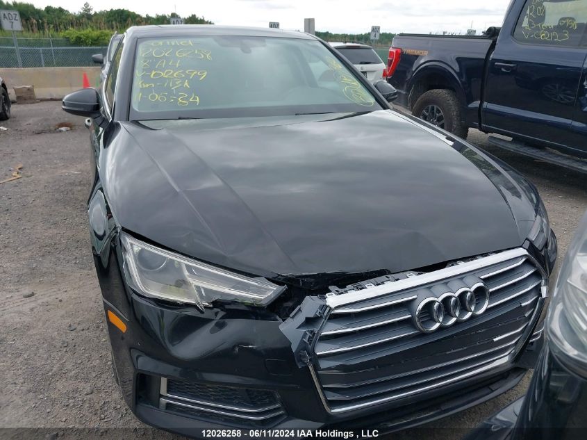 2018 Audi A4 Sedan VIN: WAUANAF47JN012699 Lot: 12026258