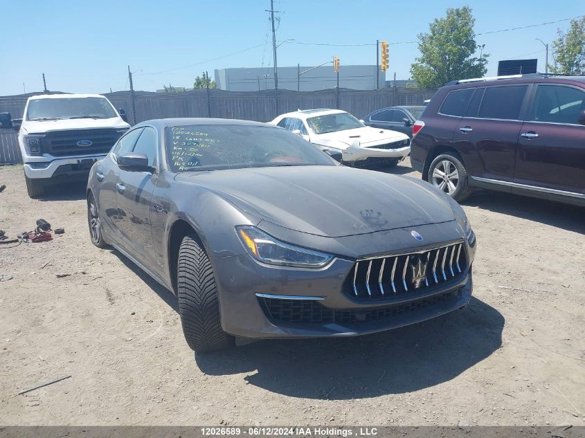 2018 Maserati Ghibli VIN: ZAM57YTLXJ1307060 Lot: 12026589